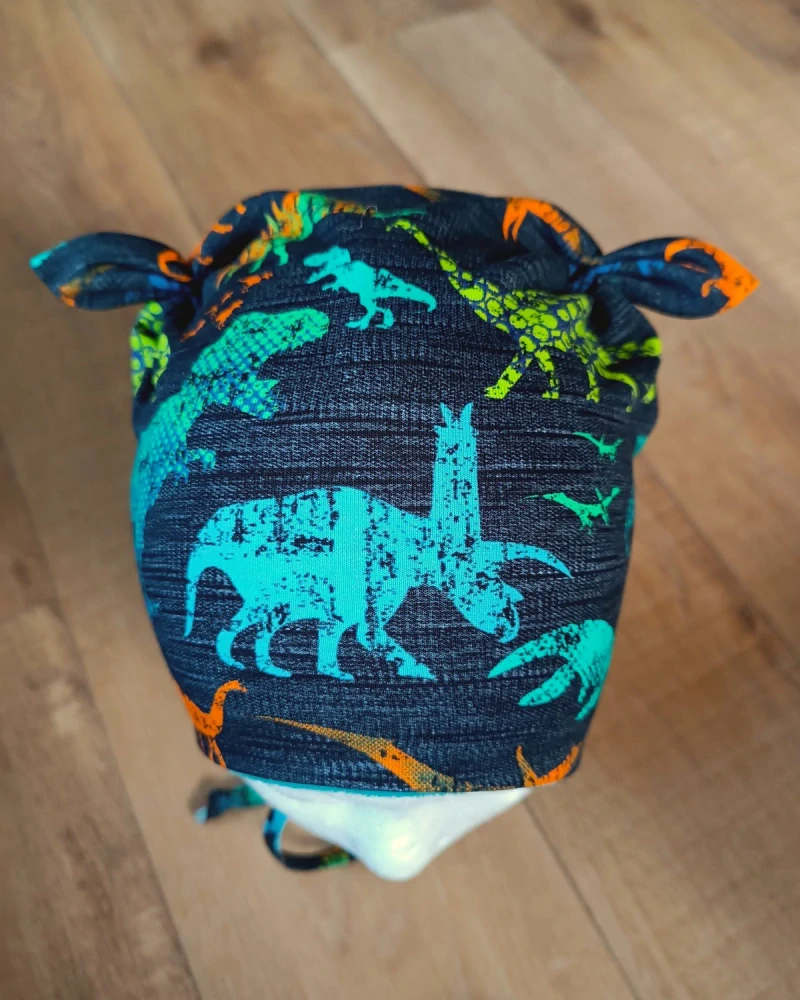 Zimní čepice na zavazování s oušky "Dino svět + petrolejový fleece"